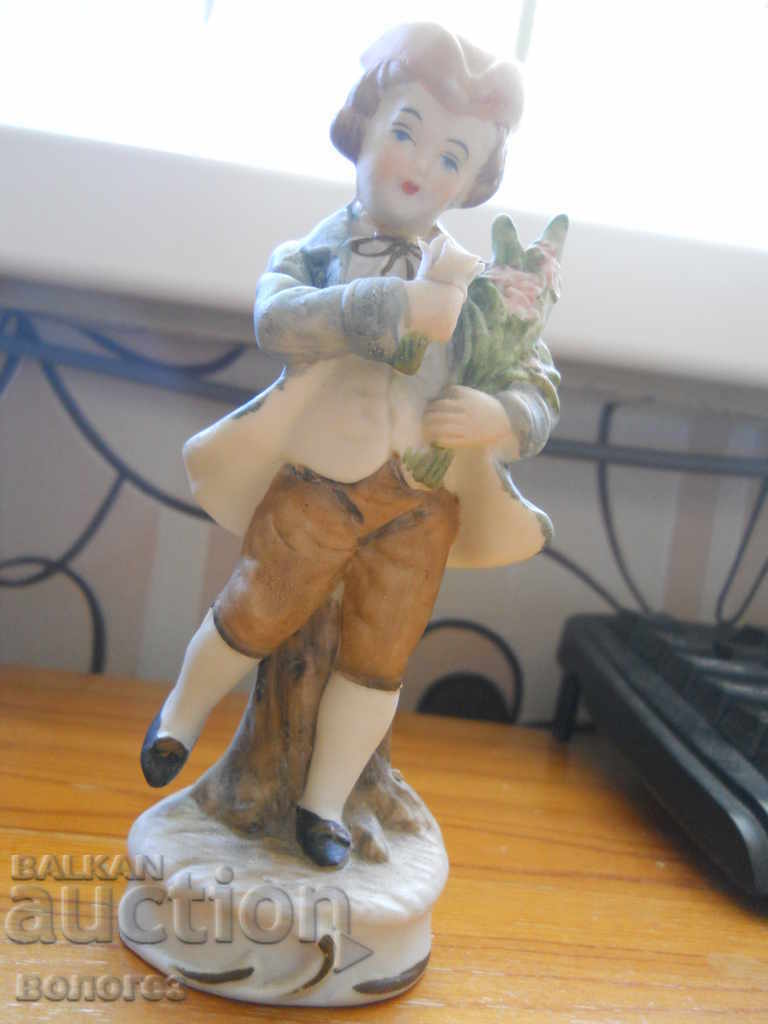 Boy with flowers - biscuit porcelain