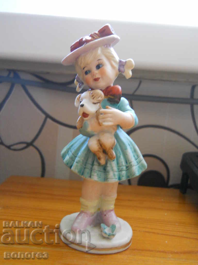 Porcelain figurine Porcelain figurine