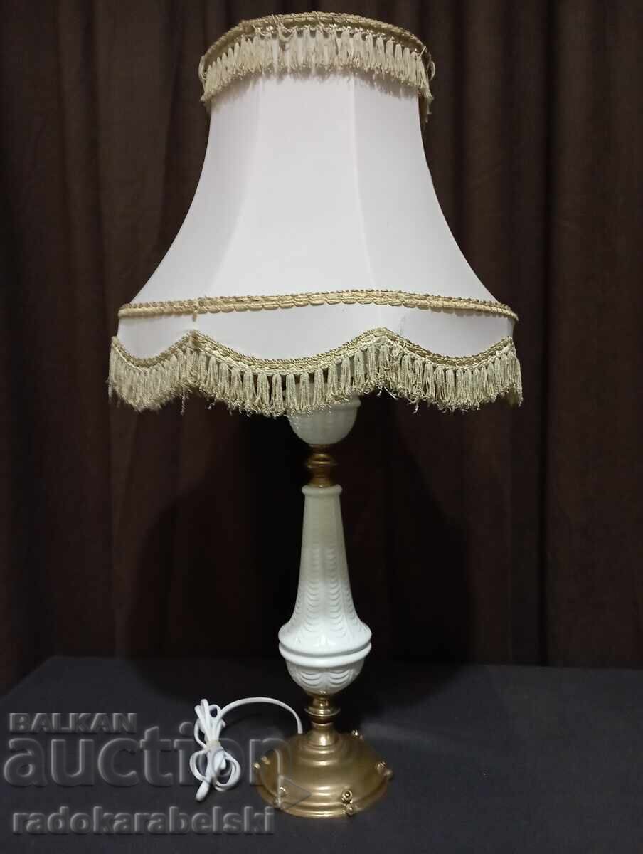 Very large antique lamp with a beautiful lampshade