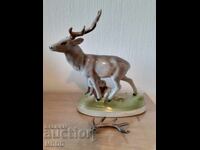 Κοινωνική πορσελάνινη φιγούρα