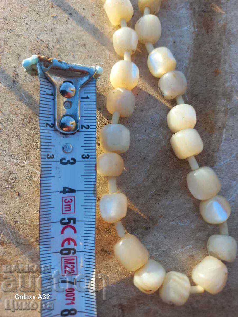 Delivery of OLD PEARL ROSARY