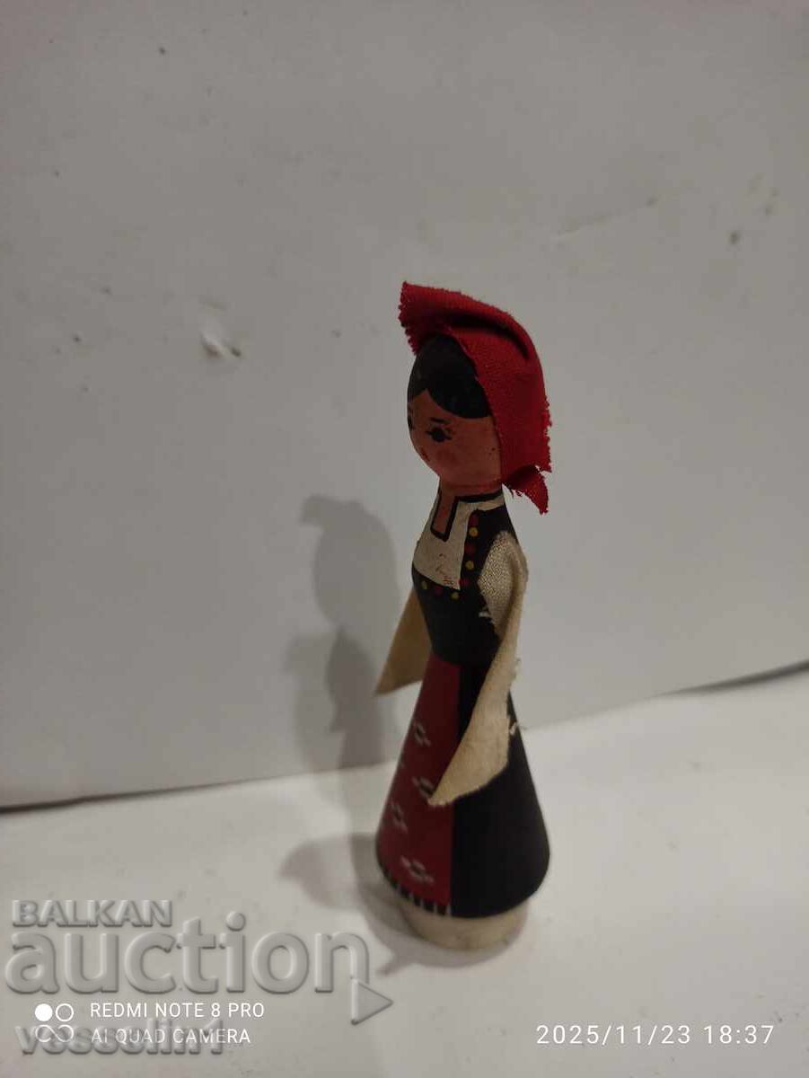 Old wooden figure, ethnic motifs, folk costume with price 24.00 BGN | € 12.27