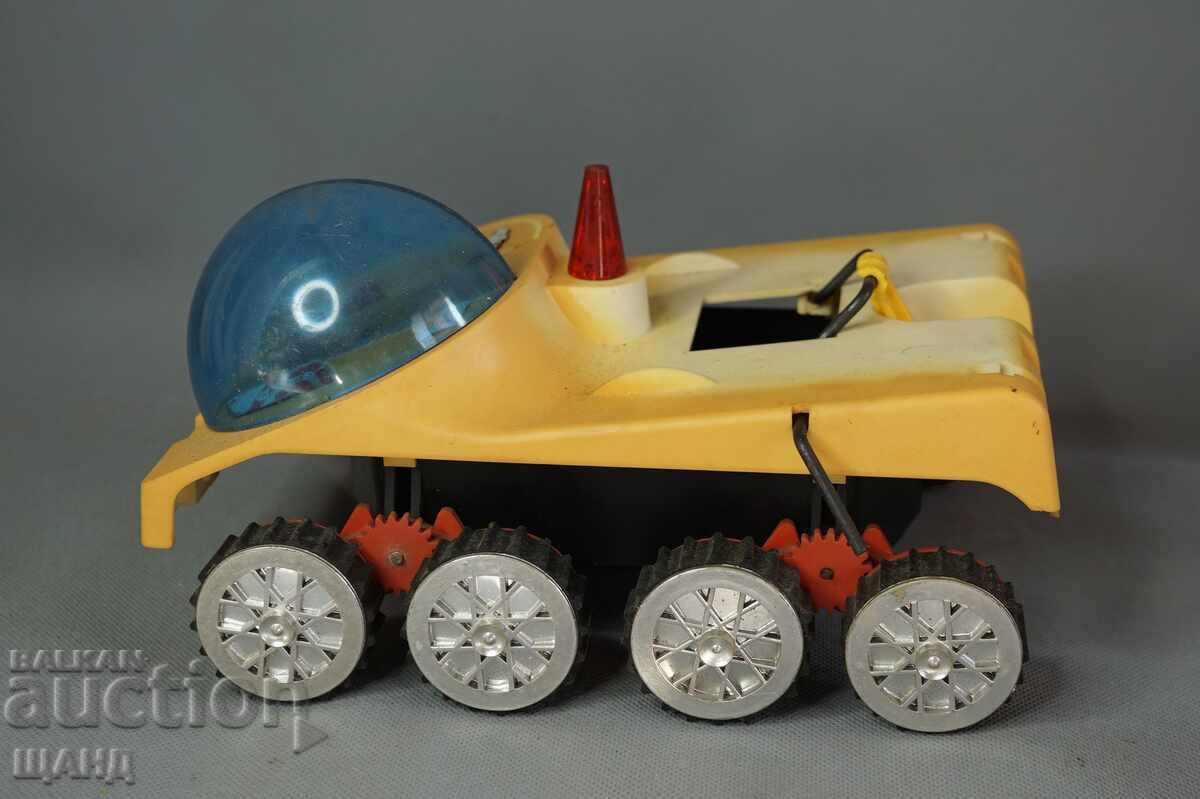 Old Russian plastic toy model Lunokhod (moon rover) on batteries