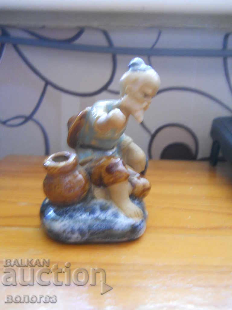 Delivery of Antique ceramic figurine - fisherman (China)