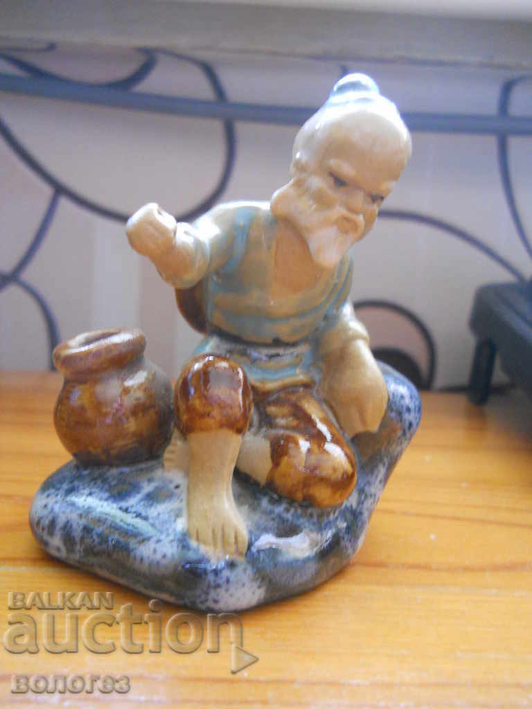Antique ceramic figurine - fisherman (China)