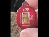 A gold bar. 0.10 grams. 24 Carat ..New.. Attention read