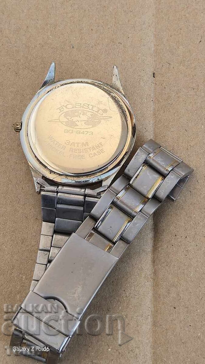 Delivery of FOSSIL QUARTZ RARE I DON'T KNOW IF IT WORKS BZC !!!!