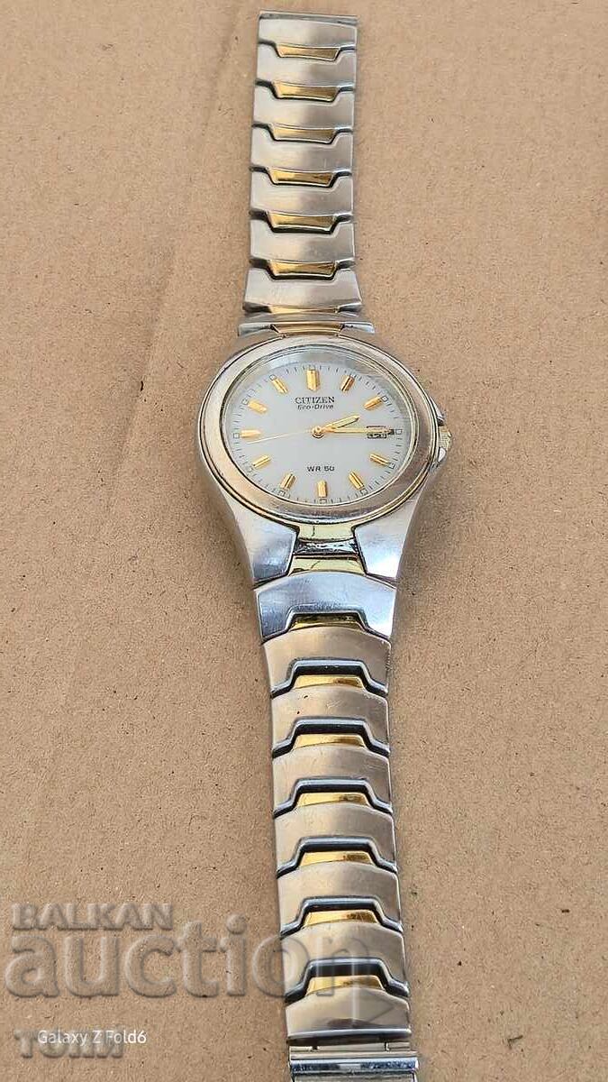 Auction  CITIZEN ECO DRIVE WR 50 QUARTZ JAPAN RARE, I DON'T KNOW IF IT WORKS