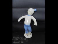 № 8387 Old porcelain figurine - Boy on skates