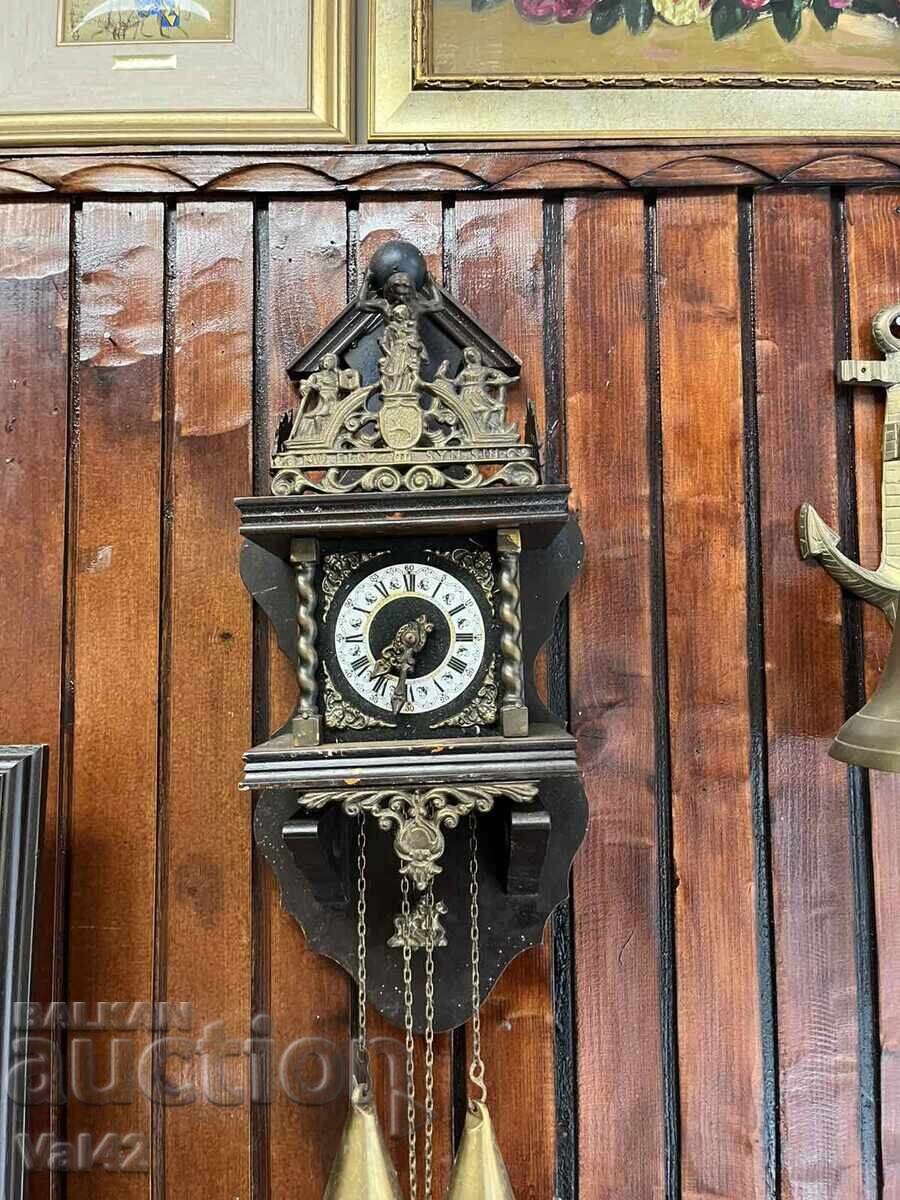 Antique wall clock with ornaments and gong - working
