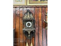 Antique wall clock with ornaments and gong - working