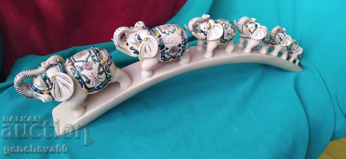 Six lucky elephants climbing a bridge - 5