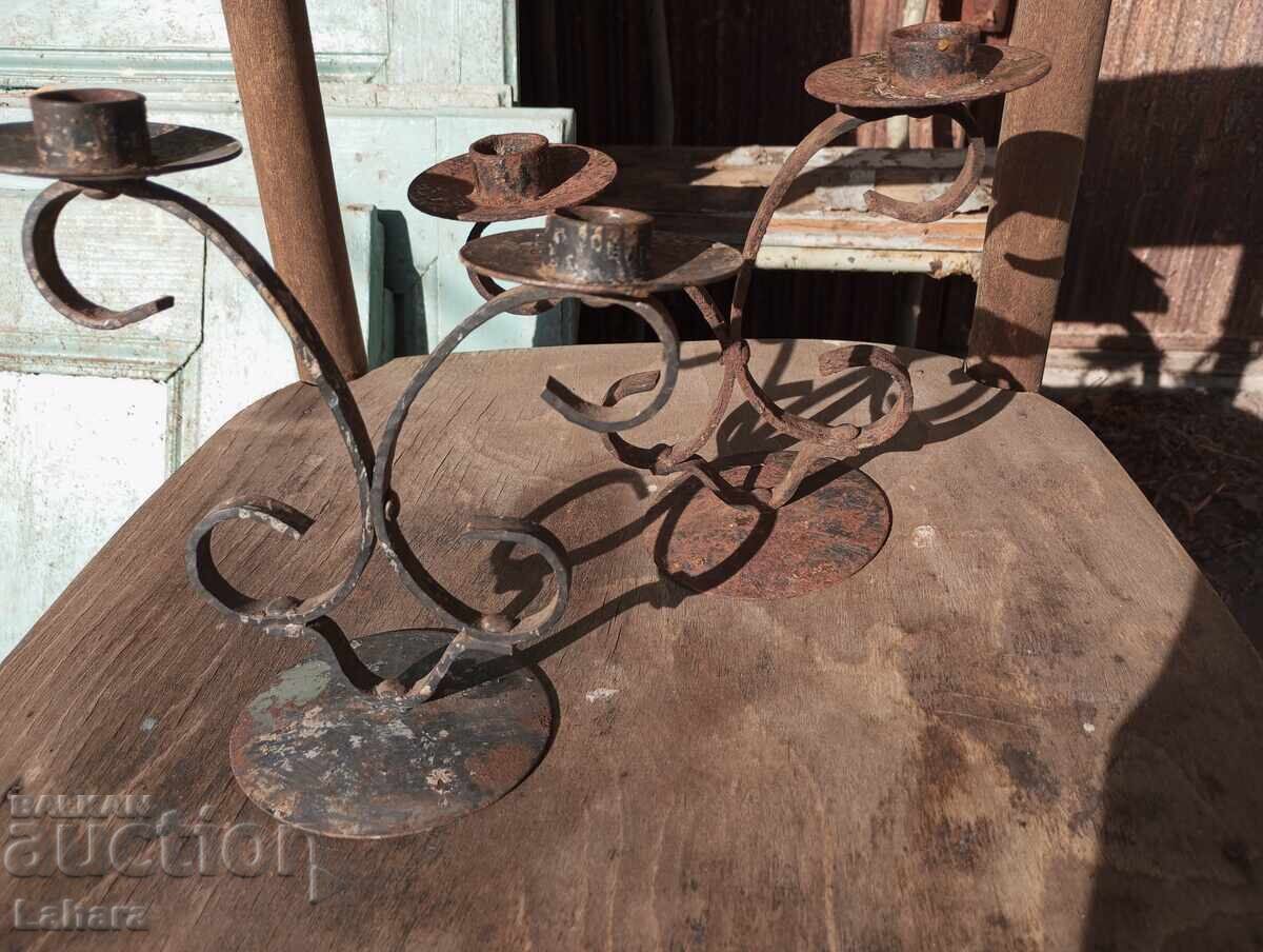 Auction Wrought iron candle holders from the socialist era Auction Wrought iron candle holders from the socialist era