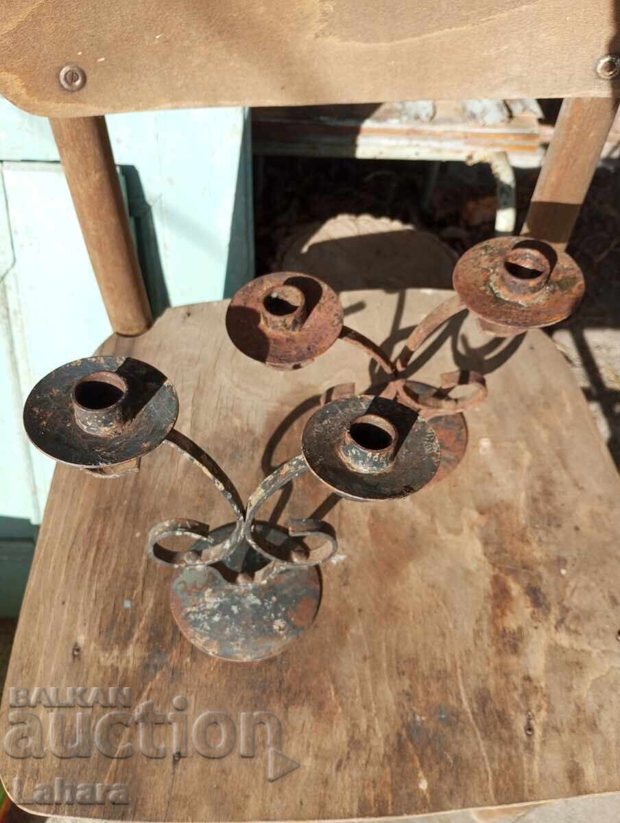 Wrought iron candle holders from the socialist era Wrought iron candle holders from the socialist era