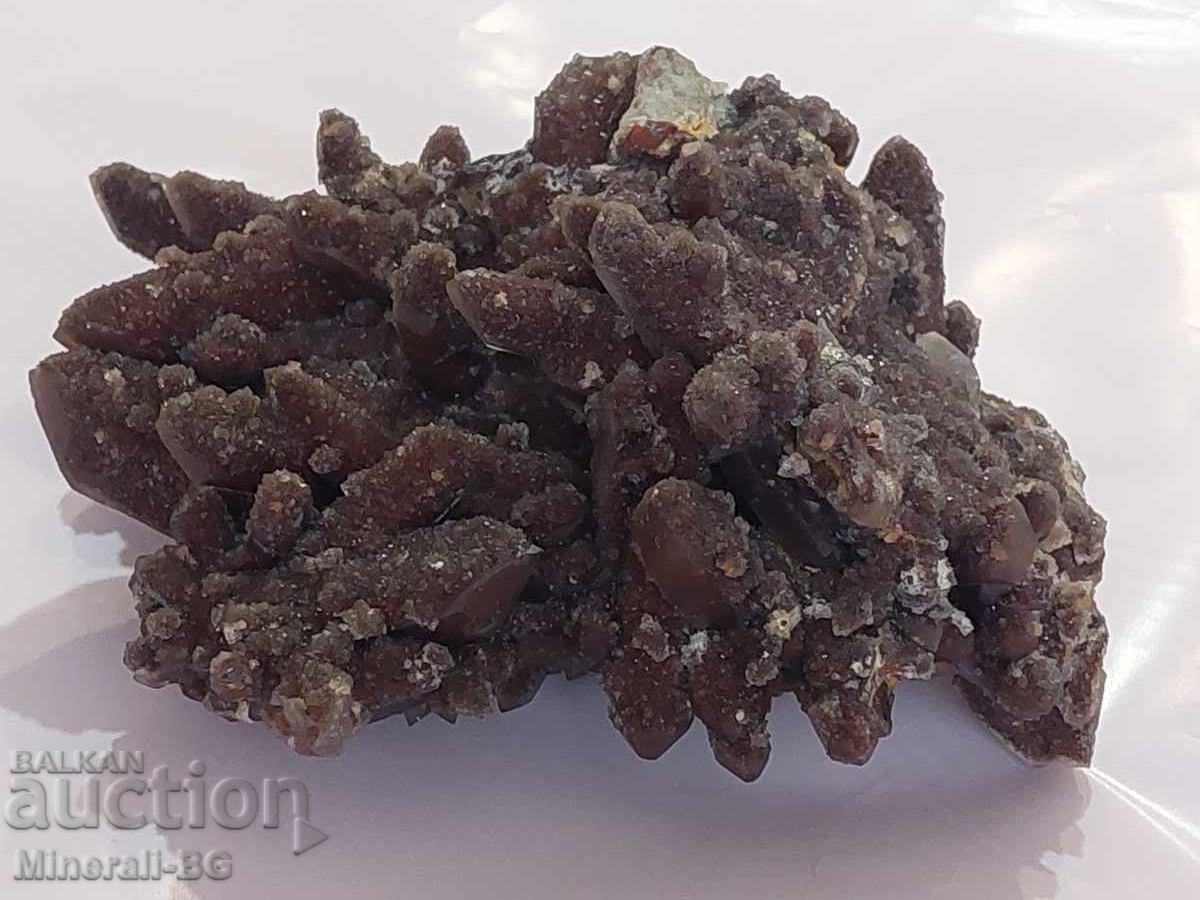 Auction  Mountain crystal with hematite. Unique