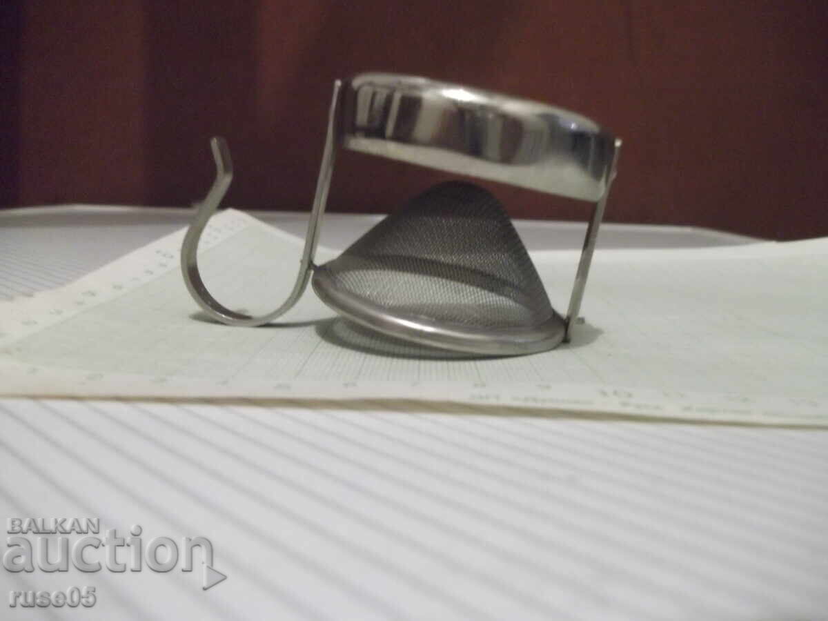 Delivery of Tea strainer swing