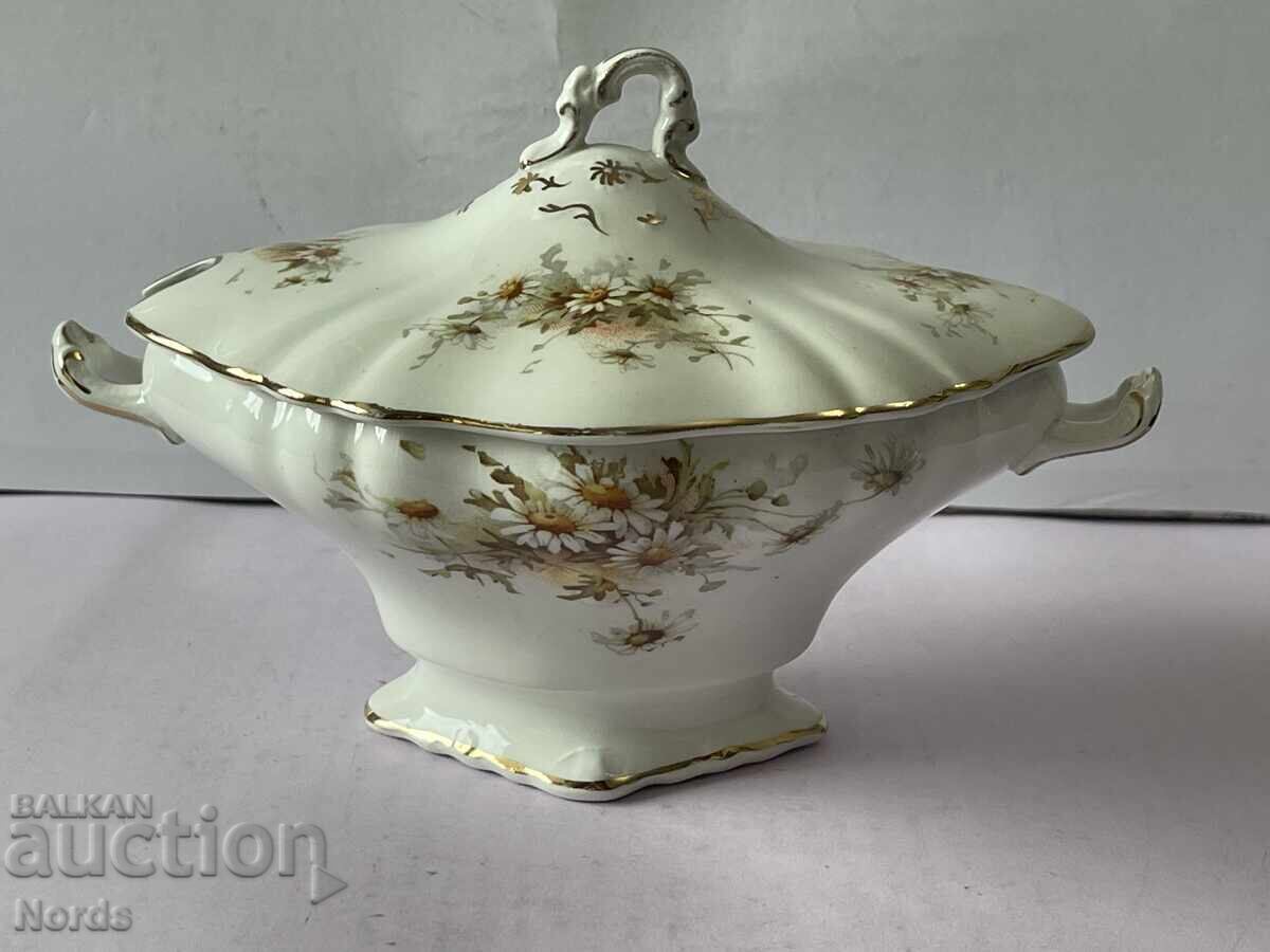 Un vas frumos din porțelan cu capac Un vas frumos din porțelan cu capac