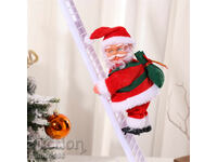 Moș Crăciun cățărător