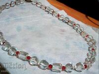 Beautiful quartz necklace with small ruby-type stones