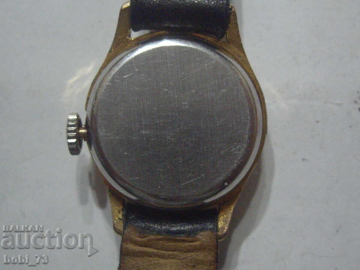 Auction  Old ladies gold watch.