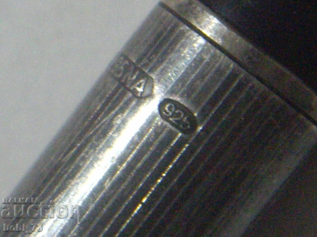Auction An old silver pen. Auction An old silver pen.