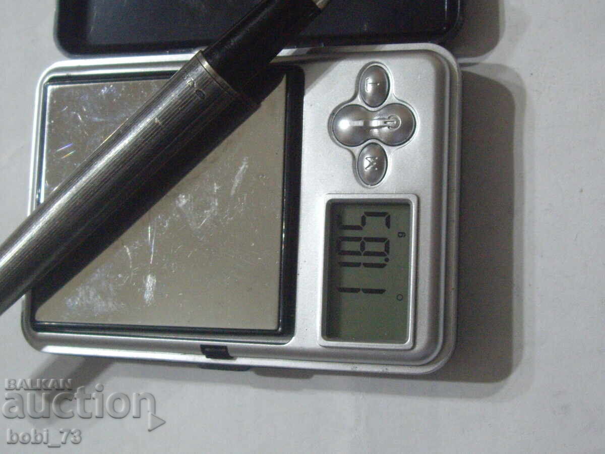 An old silver pen. - 6 An old silver pen. - 6