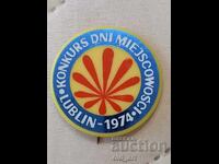 Emblemă - Zilele noastre. Locație Lublin, Polonia