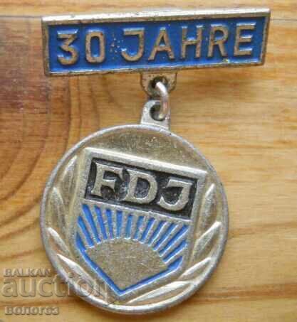Jubilee badge "30 years. FDJ" (Free German Youth) - GDR