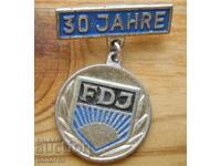 Jubilee badge "30 years. FDJ" (Free German Youth) - GDR