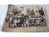 Photo of Students with their Teacher