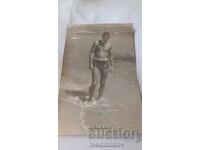 Photo of a Young Person with a Mask and Snorkel on the Seashore