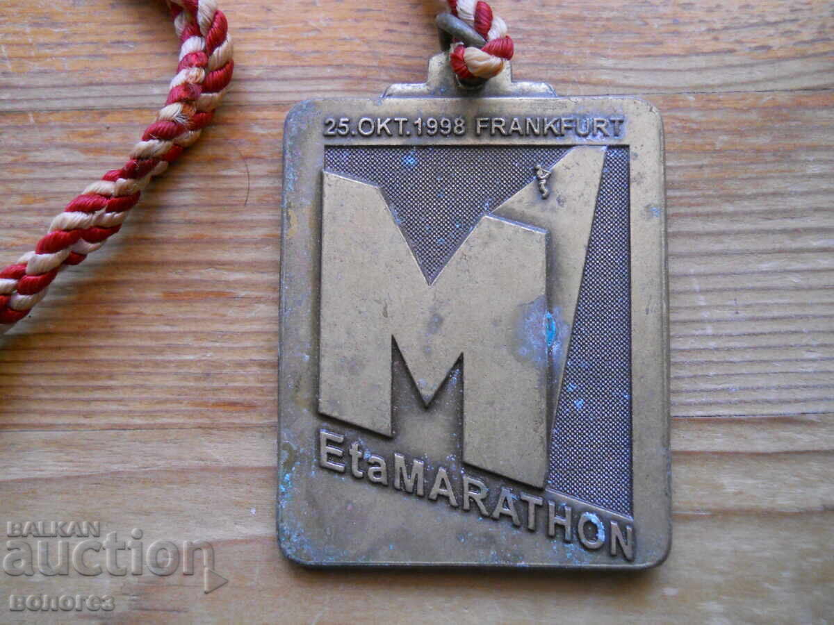 Medalie sportivă de maraton din 1998 - Germania cu preț 10.00 BGN | € 5.11 Medalie sportivă de maraton din 1998 - Germania cu preț 10.00 BGN | € 5.11