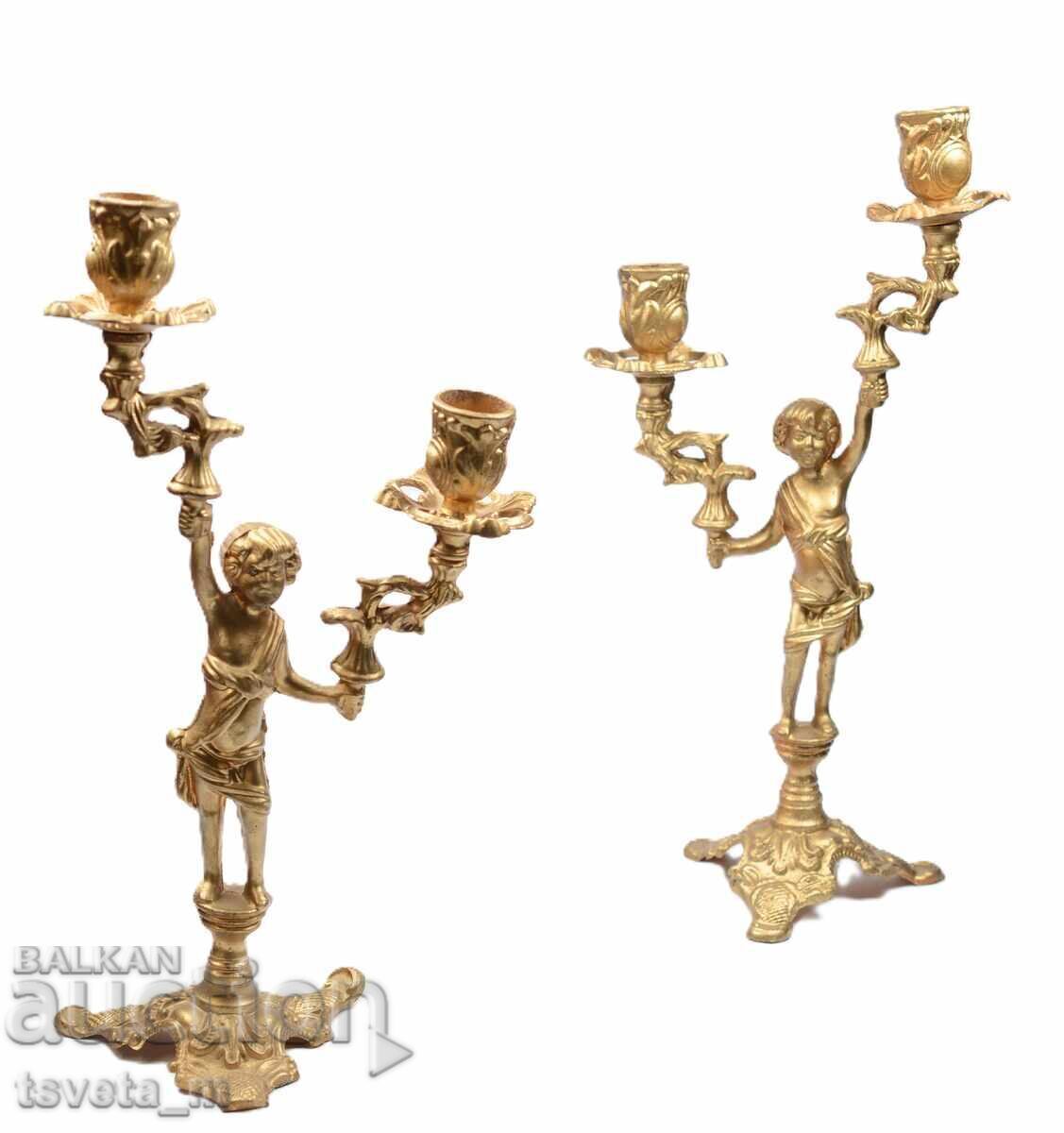 Auction  Pair of bronze Empire style candlesticks for 4 candles