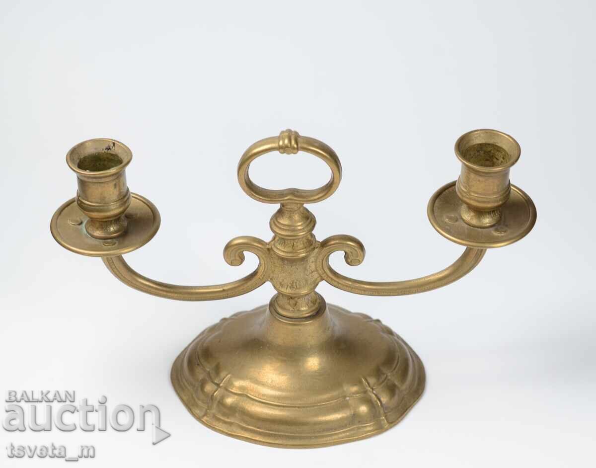 Delivery of Antique bronze candle holder for 2 candles