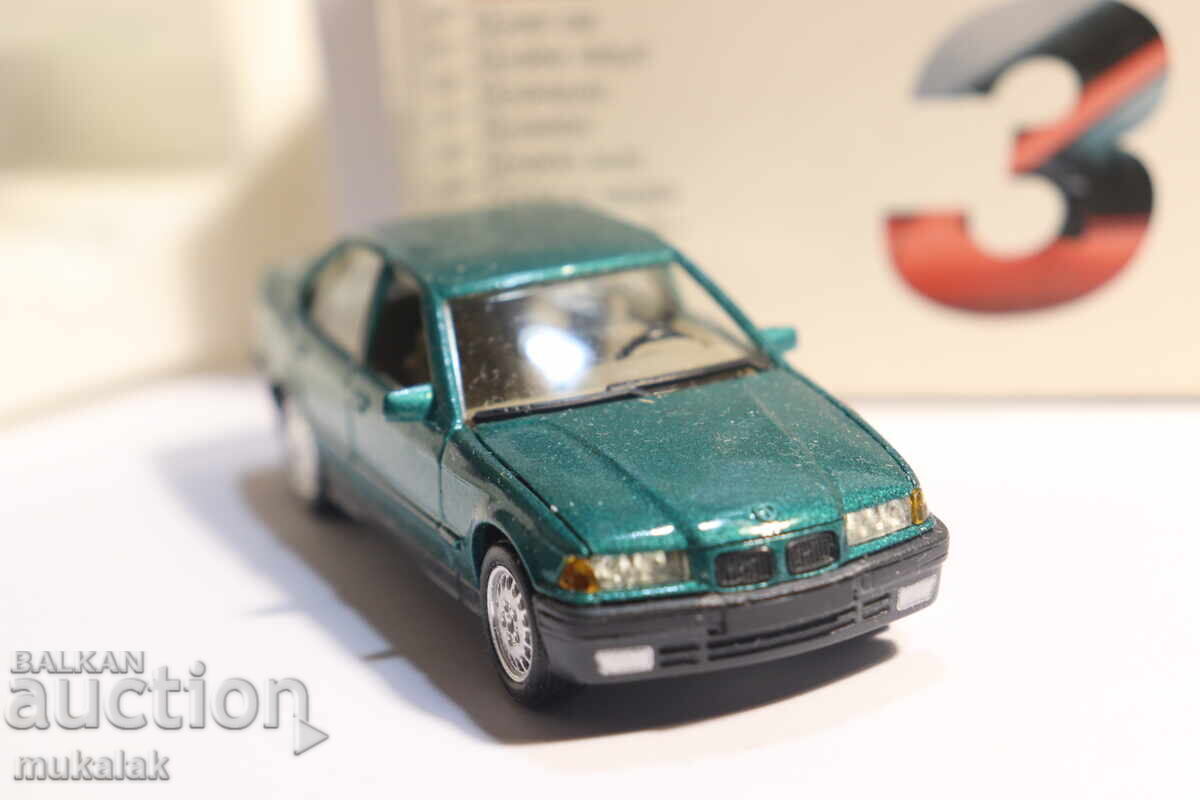 Delivery of 1:43 SOLIDO BMW 325 TOY CAR MODEL Delivery of 1:43 SOLIDO BMW 325 TOY CAR MODEL