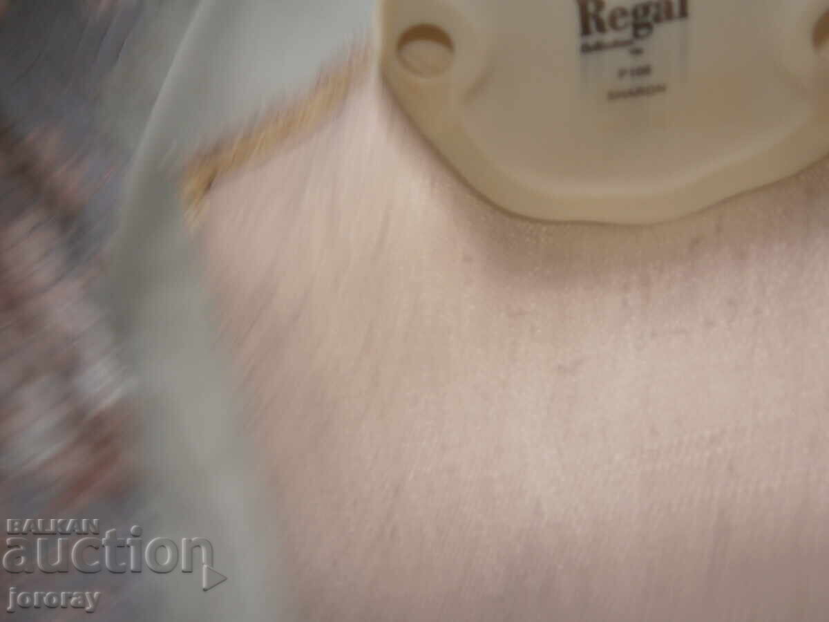 Auction  Porcelain figure, 21cm