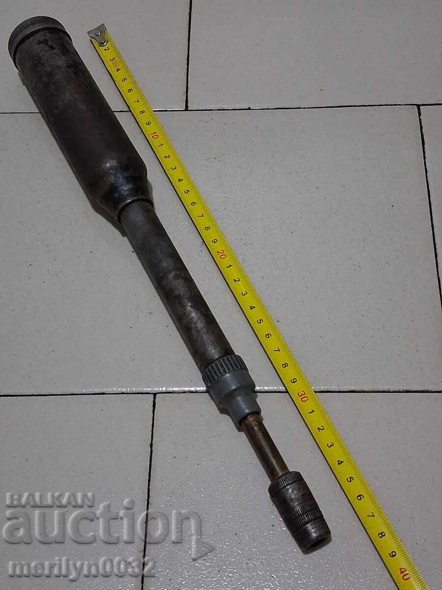 Old-fashioned grease fitting from an army engine, motorcycle grease gun