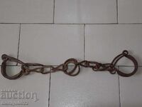 Old hand-forged buckles, chains, shackles, shackles