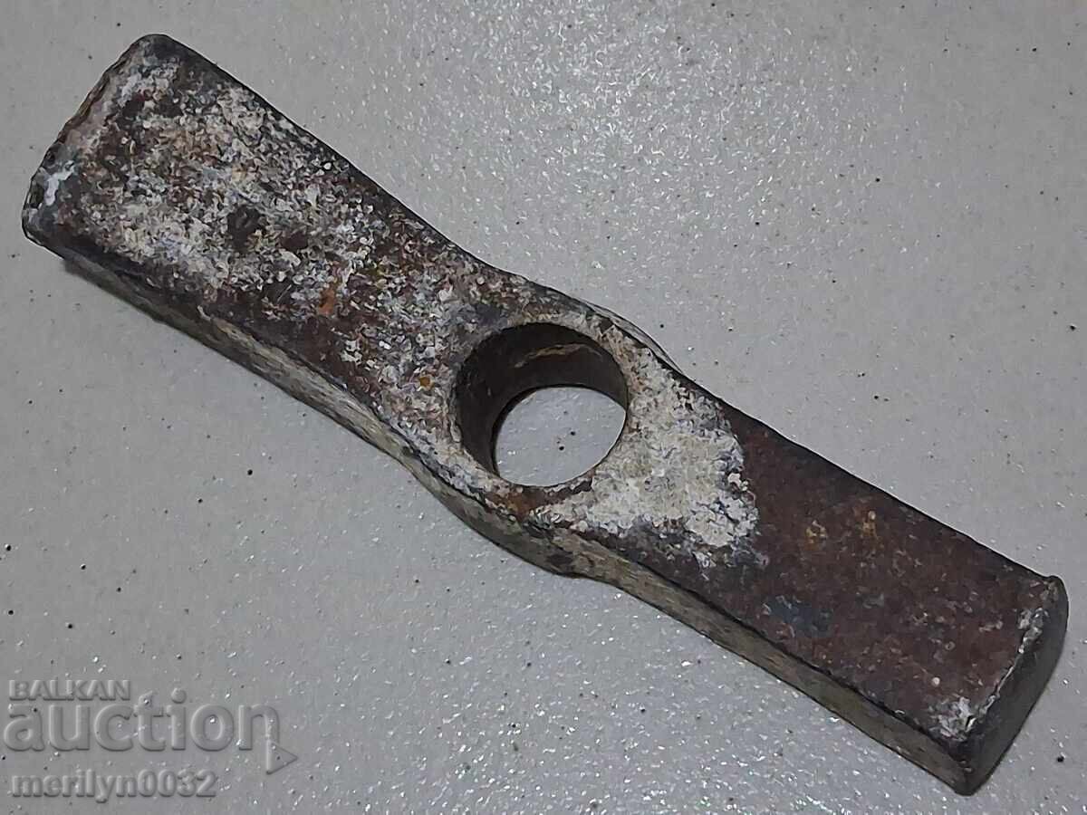 Delivery of Old wrought iron carpenter's hammer Delivery of Old wrought iron carpenter's hammer