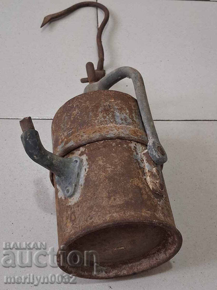 Delivery of Miners carbide lamp early 20th century