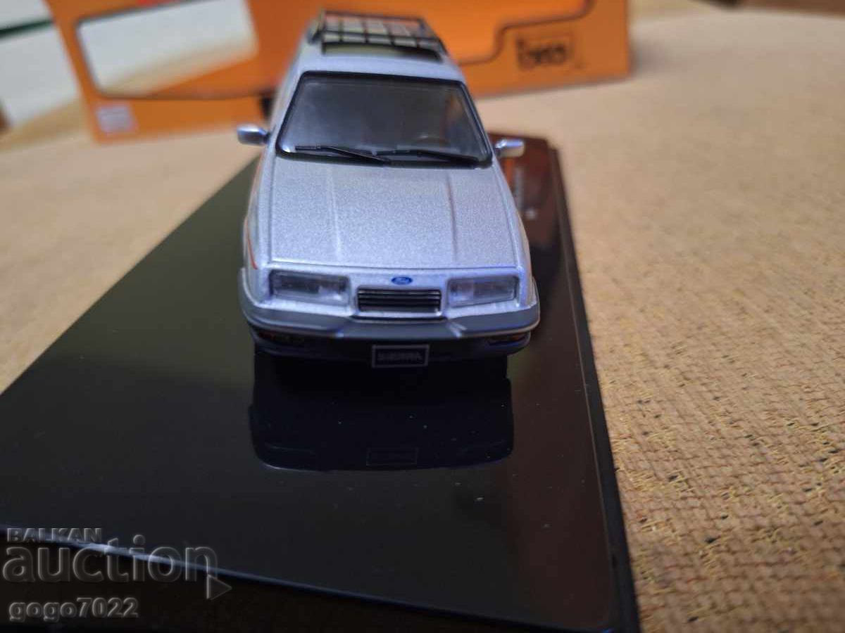 Delivery of FORD SIERRA IXO 1/43