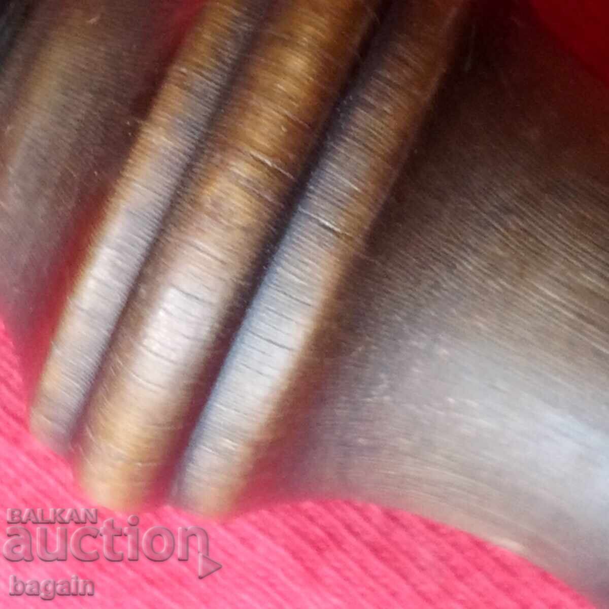 Rhinoceros horn handle