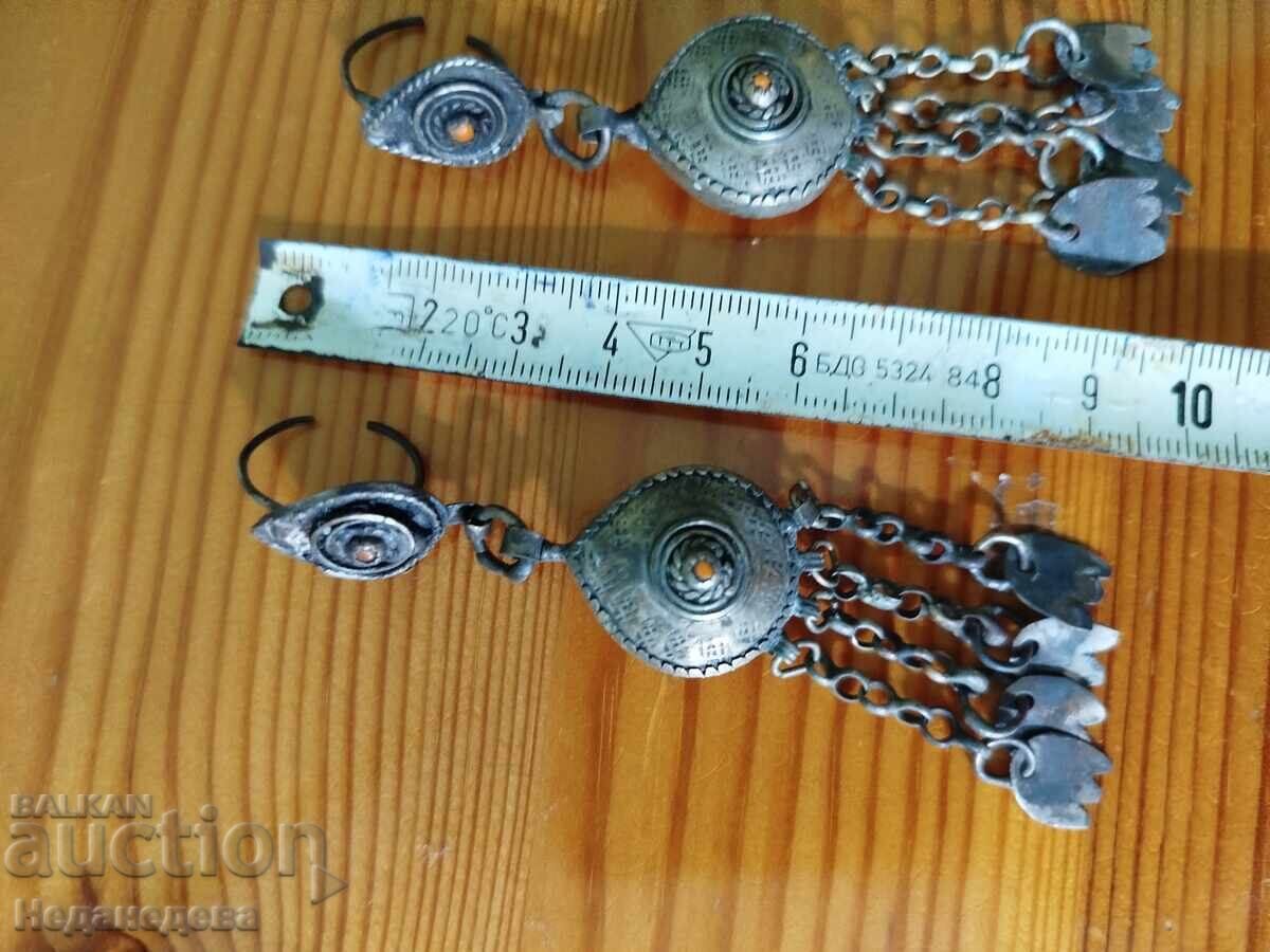 Δημοπρασία Αρπάλιες, Νάτμπουμ, Σκουλαρίκια