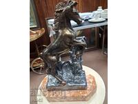 Figure of a standing horse - polymer resin with a marble base