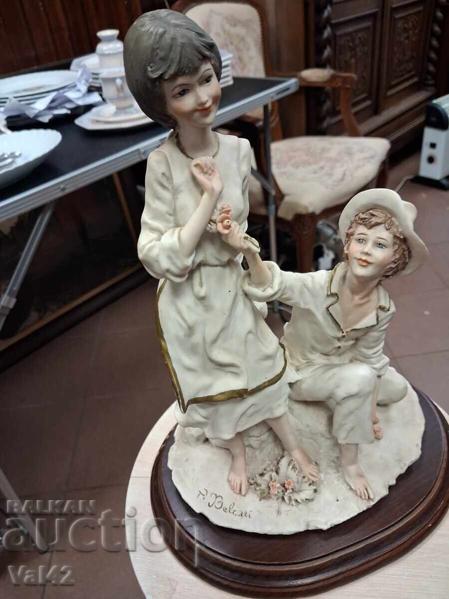 Auction Figure "Boy and Girl" - polymer resin, signed A. Belcari Auction Figure "Boy and Girl" - polymer resin, signed A. Belcari