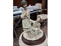 Figure "Boy and Girl" - polymer resin, signed A. Belcari
