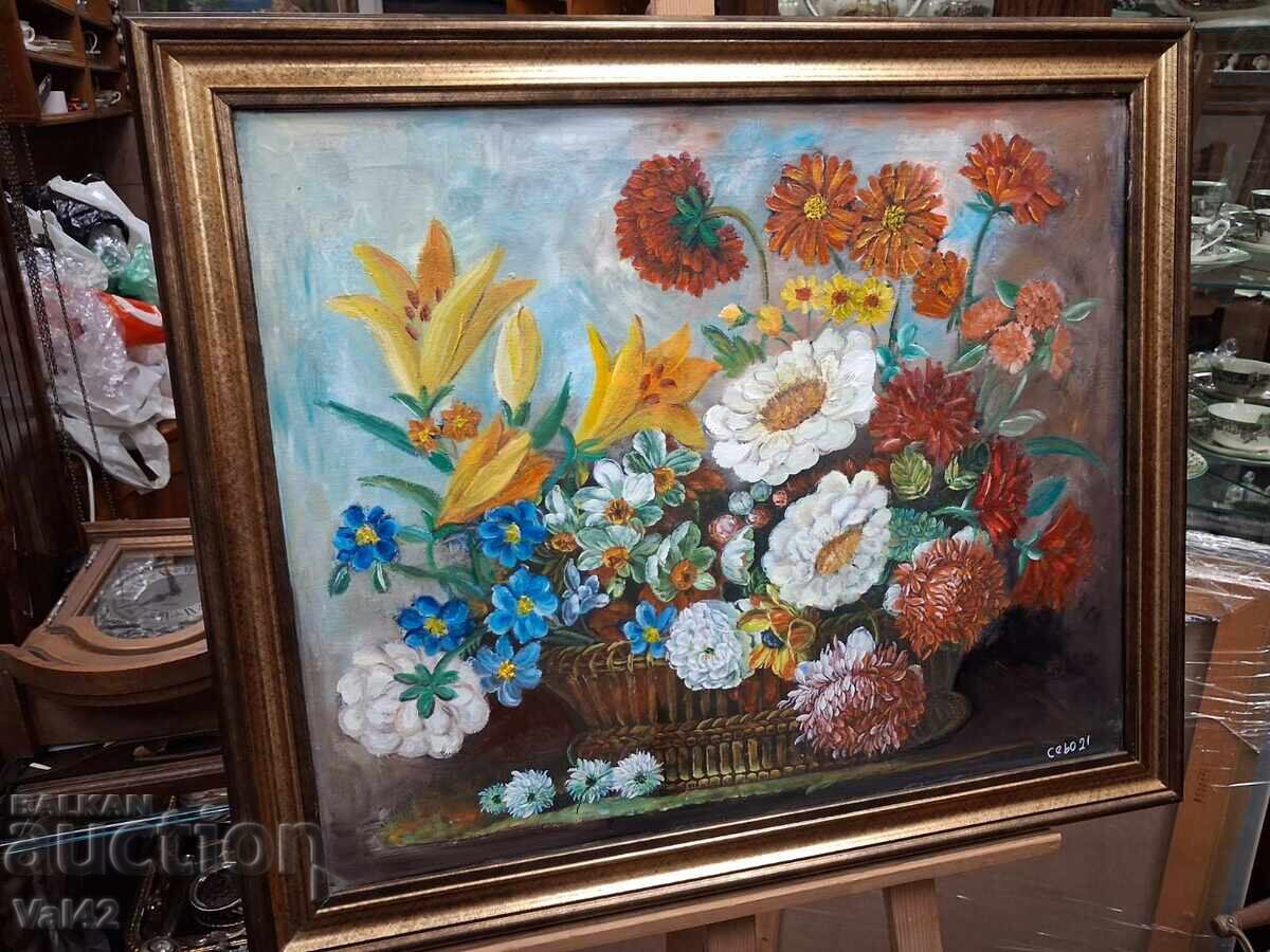 Auction  Colorful composition with a bouquet in a basket