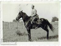 Small old photo of a military cavalryman on a horse E644