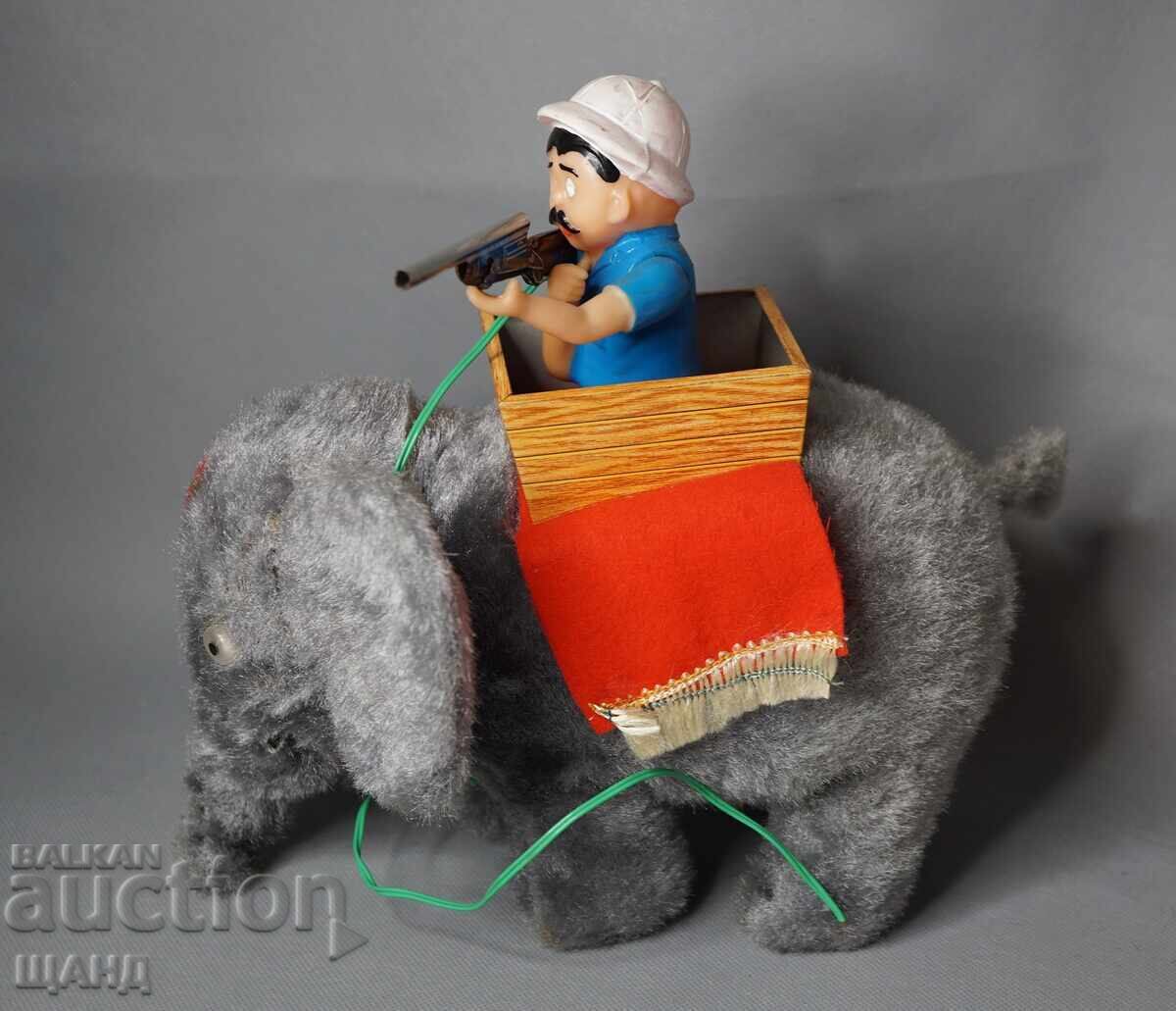 Auction Old Japanese Metal Elephant Hunter Toy Auction Old Japanese Metal Elephant Hunter Toy