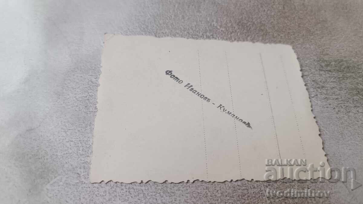 Photo: Man and two women in front of beach cabins with price 1.85 BGN | € 0.95 Photo: Man and two women in front of beach cabins with price 1.85 BGN | € 0.95